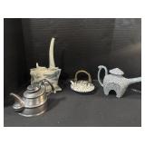 4 Ceramic Teapots.