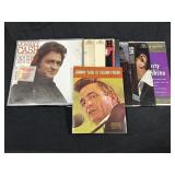 9 Johnny Cash Records & Folsom Song Book.