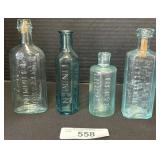 4 Blown Glass Aqua Liniment Medicine Bottles.