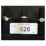 2 Silver Rings, 1 Sterling Silver Ring.
