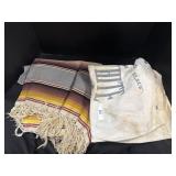 Laundry Bag & Striped Rug.