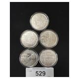 5 .999 Fine Silver Rounds.