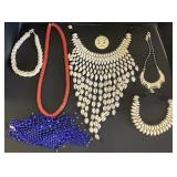 Cowrie Shell, Bone Pendant & Beaded Necklaces.