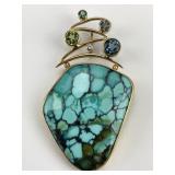 Gold Turquoise Pendant with Gemstone Accents.
