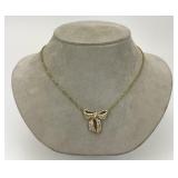 14KT Gold Diamond Ribbon Pendant Necklace.