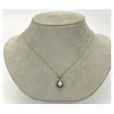 14KT Gold Opal & Garnet Halo Pendant Necklace.