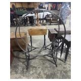 Large Circular Wrought Iron Firewood Holder.