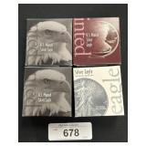 4 U.S Minted Silver Eagle Dollars.