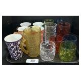 Amber Glass Pitcher, Ceramic Mugs.