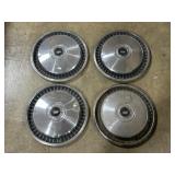 4 Vintage Ford Hubcaps.