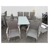 Nice Glass Top Patio Table & (10) Chairs.