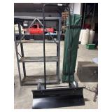 Snowplow Style Snow Shovel.
