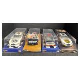 4 Die-Cast Collectors Cars.