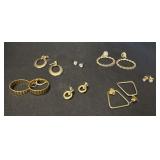 7 Pairs Of Costume Earrings.