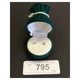 14Kt Gold Diamond Stud Earrings.