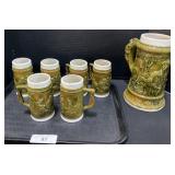 Majolica Style Pitcher & Steins.