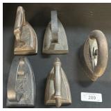 5 Antique Cast Iron Irons.