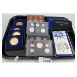 4 Commemorative Coins, 10 U.S. Proof Sets.