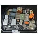 Tray Of Various Lighters.