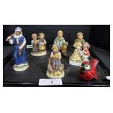 7 Ceramic Hummel Figures.