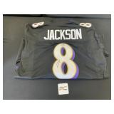 Lamar Jackson Autographed Jersey.
