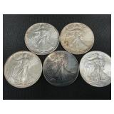 5 .999 Fine Silver American Eagle Dollars.