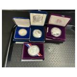 4 99.9% Silver Commemorative Coins.