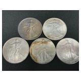 5 .999 Fine Silver American Eagle Dollars.