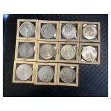 11 90% Silver Peace % Morgan Dollar Coins.