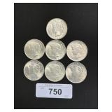 7 1922-1923 90% Silver Peace Dollars.