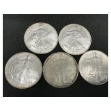 5 .999 Fine Silver American Eagle Dollars.