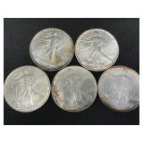 5 .999 Fine Silver American Eagle Dollars.