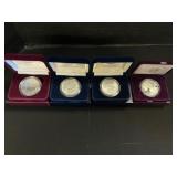 4 99.9% Silver American Eagle Dollar Coins.