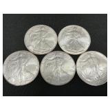 5 .999 Fine Silver American Eagle Dollars.
