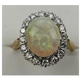 14KT Gold Cabochon Opal & Diamond Halo Ring.