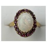 14KT Gold Opal & Ruby Halo Ring.
