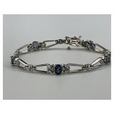 14KT White Gold Blue Topaz & Diamond Bracelet.