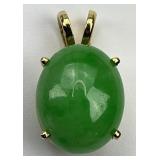 14KT Gold Cabochon Jade Pendant.