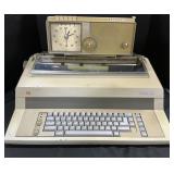 Motorola Radio Clock & TA Royal 501 Typewriter.