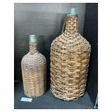 2 Wicker Wrapped Demijohn Bottles.