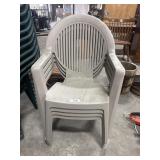 (4) Beige Plastic Patio Chairs.