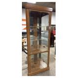 Lighted Corner Curio Cabinet.