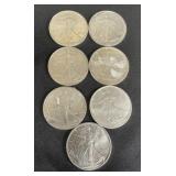 7 90% Silver Walking Liberty Coins.