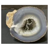 Miner Figure Inside Geode.