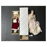 2 Beautiful Porcelain Dolls.