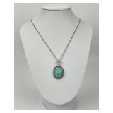 18KT Gold LeVian Diamond & Pale Blue Necklace.