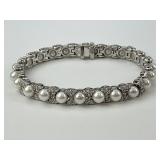 14KT Gold Pearl and Diamond Bracelet.