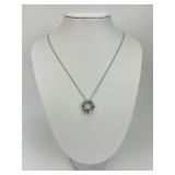 14KT Diamond Pendant on Singapore Chain.