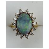 18KT Gold Vibrant Opal Diamond Halo Ring.
