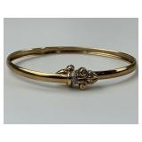 10KT Gold Fleur de lis Diamond Bangle.